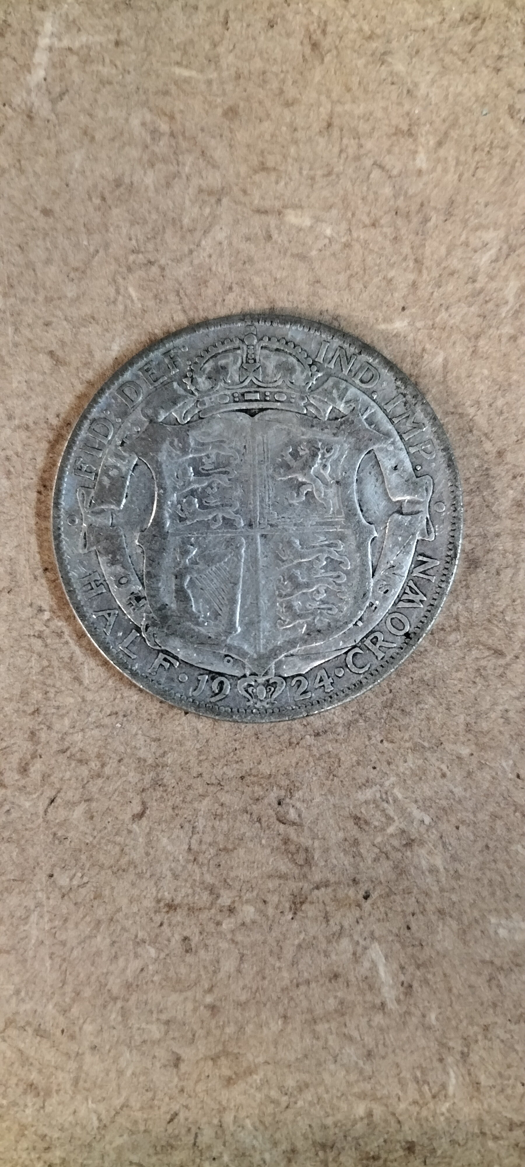 A 1924 George V .500 Silver Half Crown Coin
