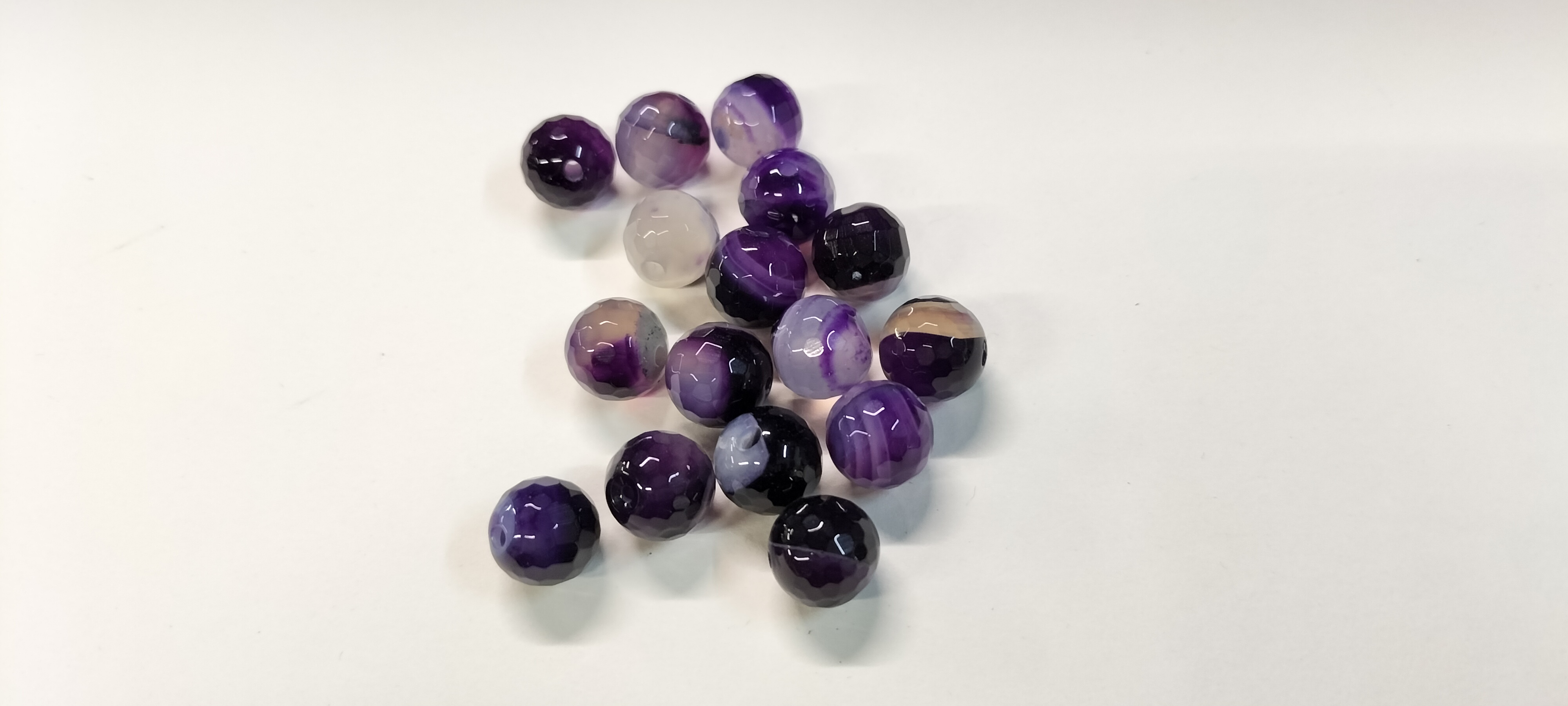 15x Faceted Purple Banded Amethyst Gemstone Beads. 109.10 ct