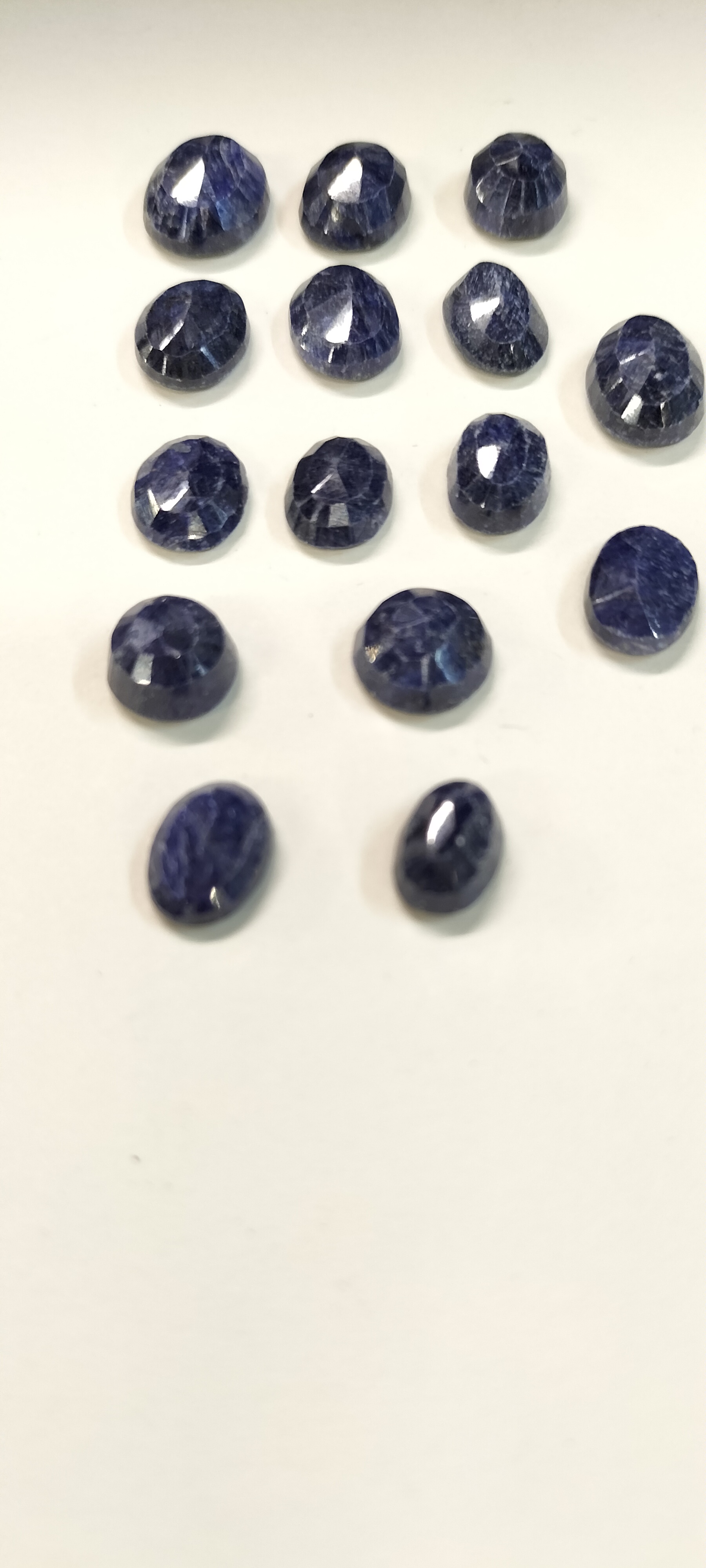 14  Lapis Lazuli Mixed Cut Gemstones. 74.50 ct