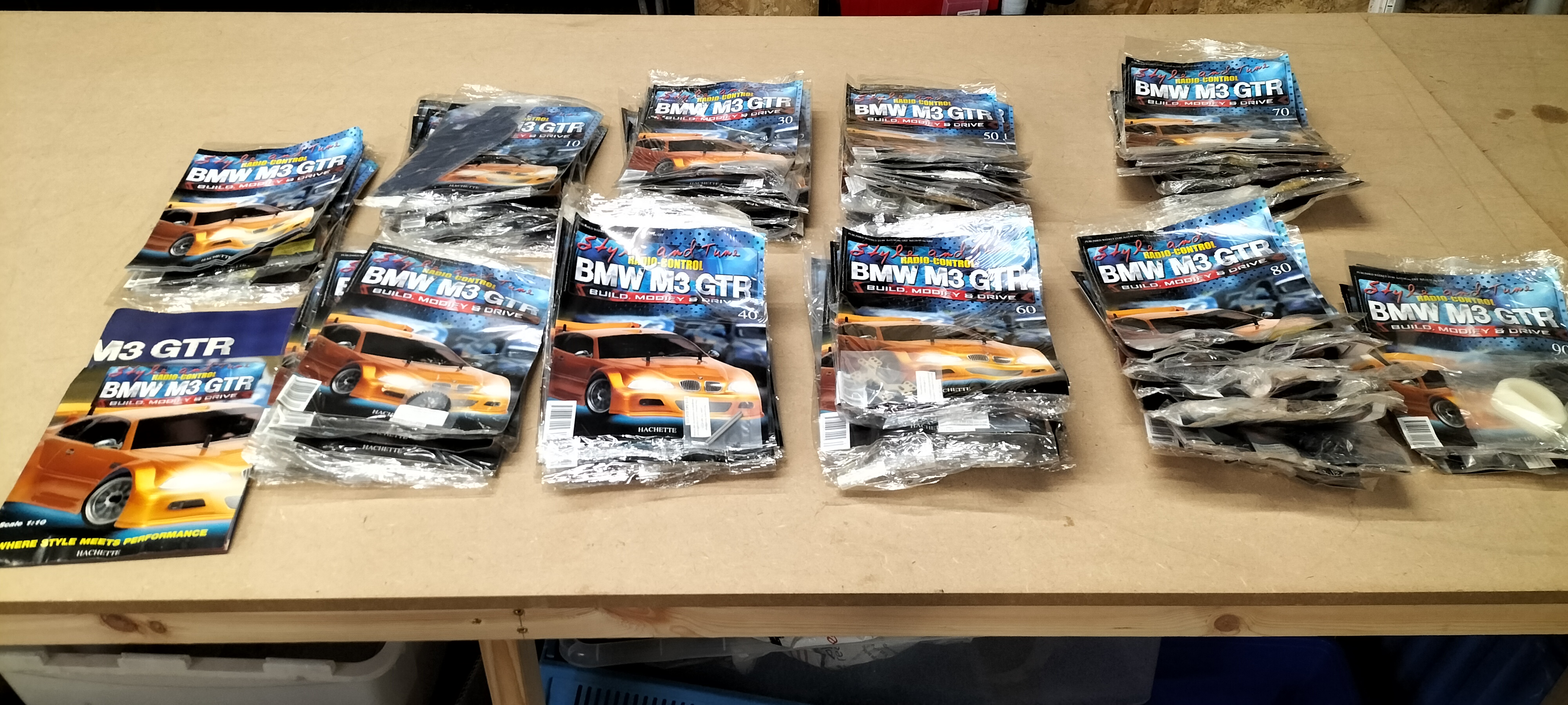 A Collection of Hachette BMW M3 GTR 1:10 Scale Model Kit Magazines Including Issues 1 To 90