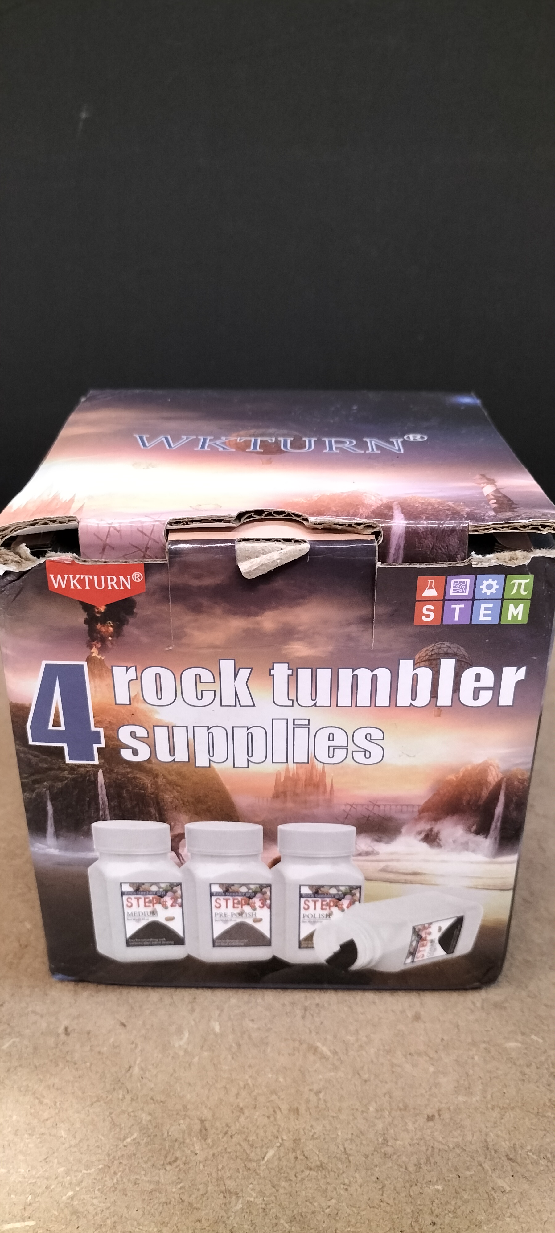 A Set of 4 WKTURN Rock Tumbler Grit Bottles with Measuring Scoop and Leaflet