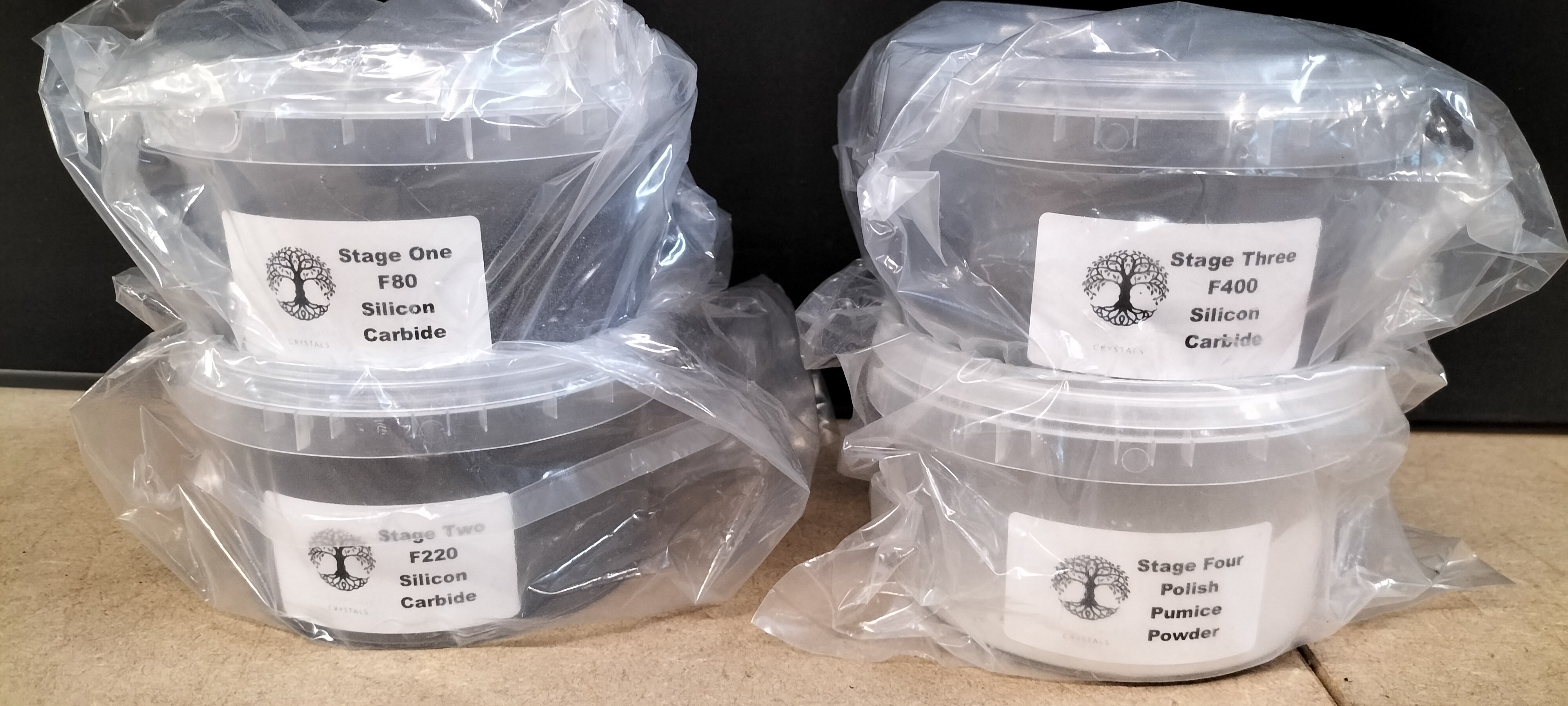 A Set of 4 New Shropshire Crystals Plastic Rock Tumbling Grit and Polish Tubs