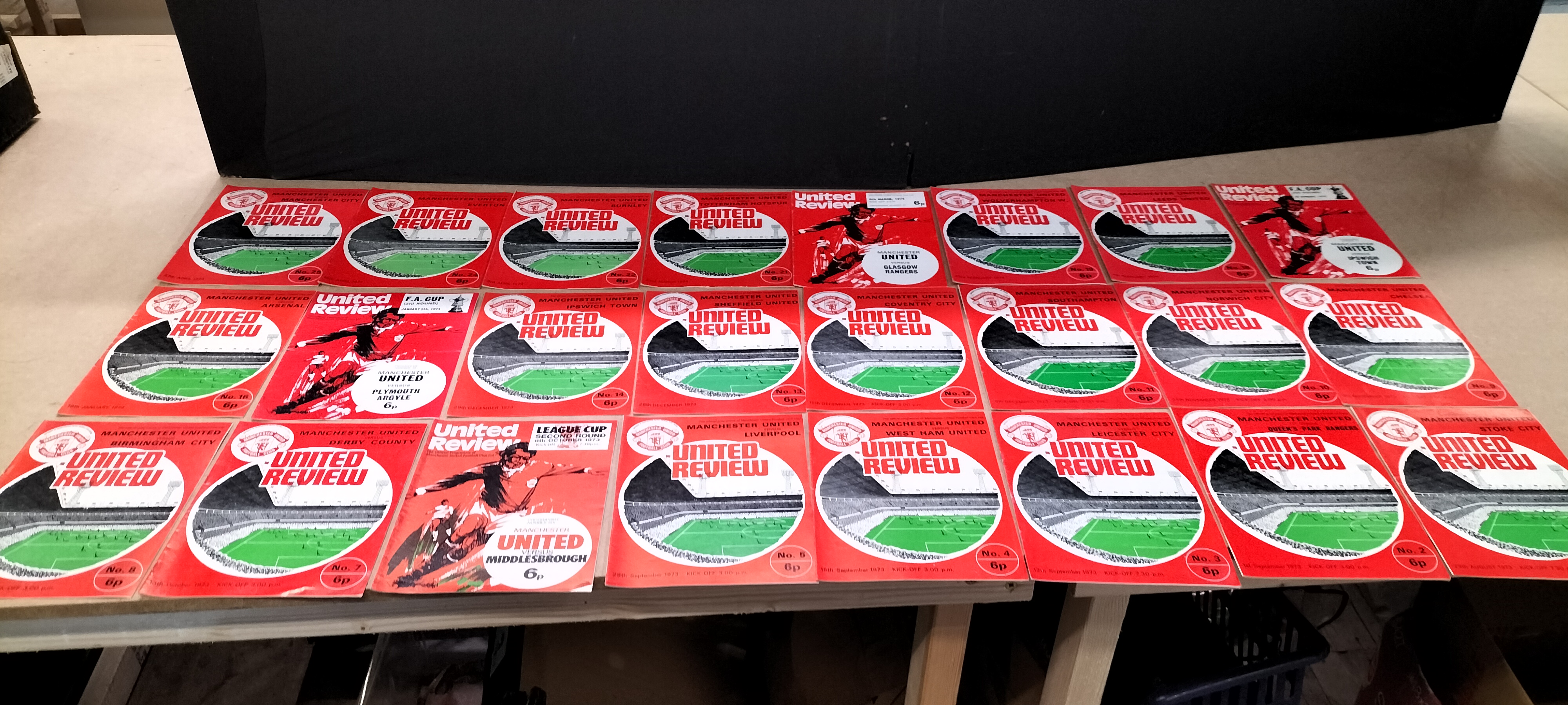 A Collection of 24 Vintage Manchester United 'United Review' Paper Football Programmes