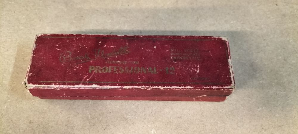 Lot 378: A Vintage Borrah Minevitch Metal and Wood Harmonica, Technique-Tone Professional-12
