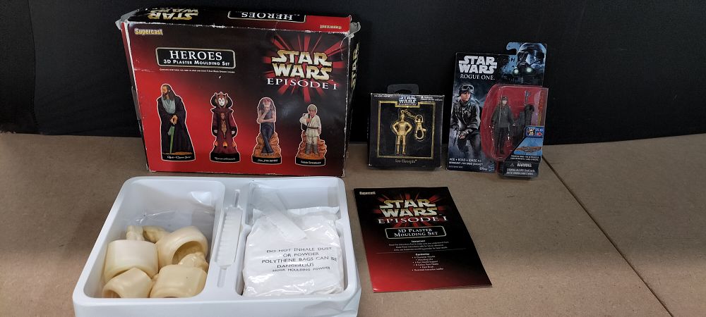 Lot 381: An Assortment of 3 Star Wars Supercast and Hasbro Collectibles