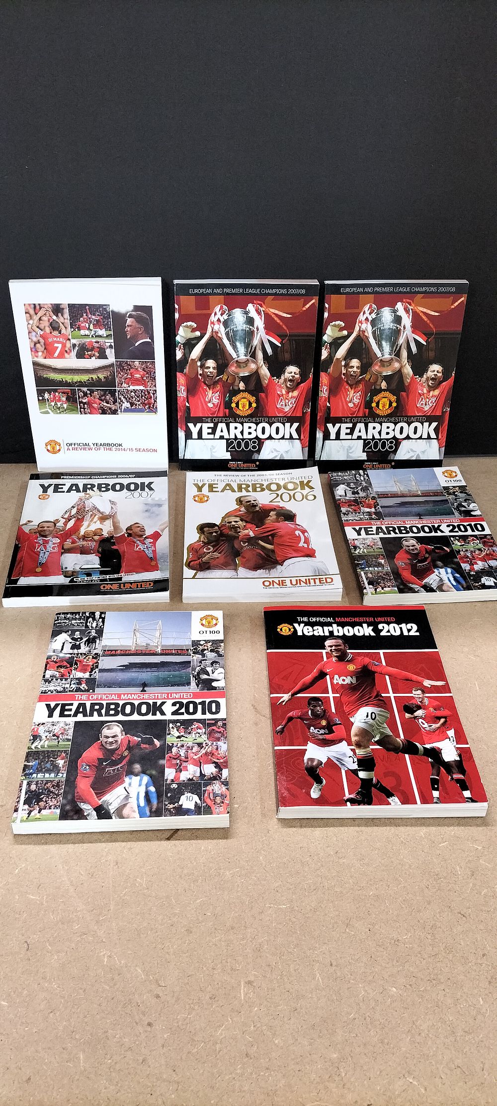Lot 392: 8 Printed Paper Manchester United Yearbooks and Season Reviews