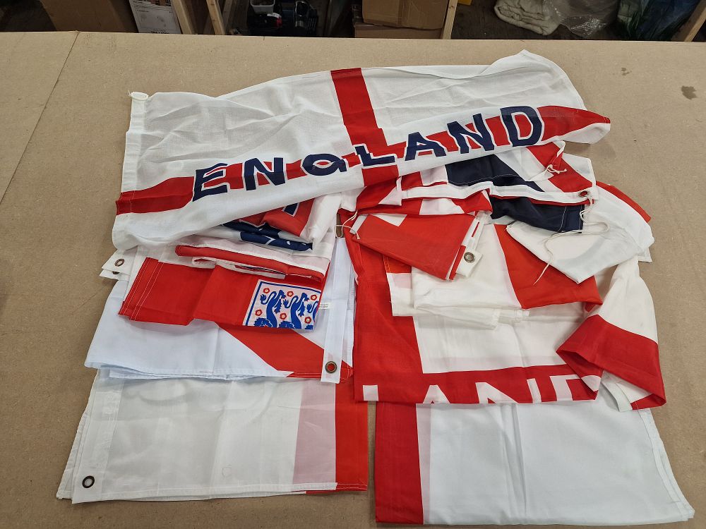 Lot 489: An Assortment of Synthetic Fabric England Football and St Georges Cross Flags