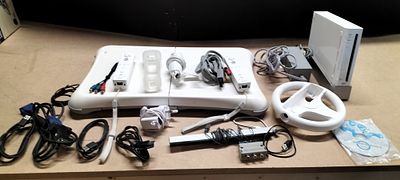 A Collection of Nintendo Wii Console Equipment, Model RVL-001(EUR). Tested for Power