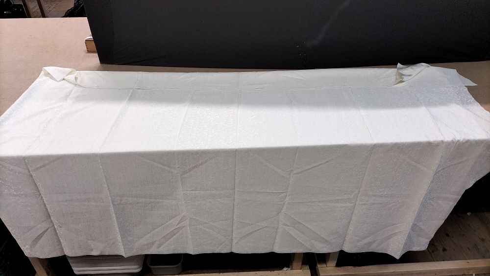 Lot 192: A Single Off-White Damask Style Floral Patterned Textile Tablecloth