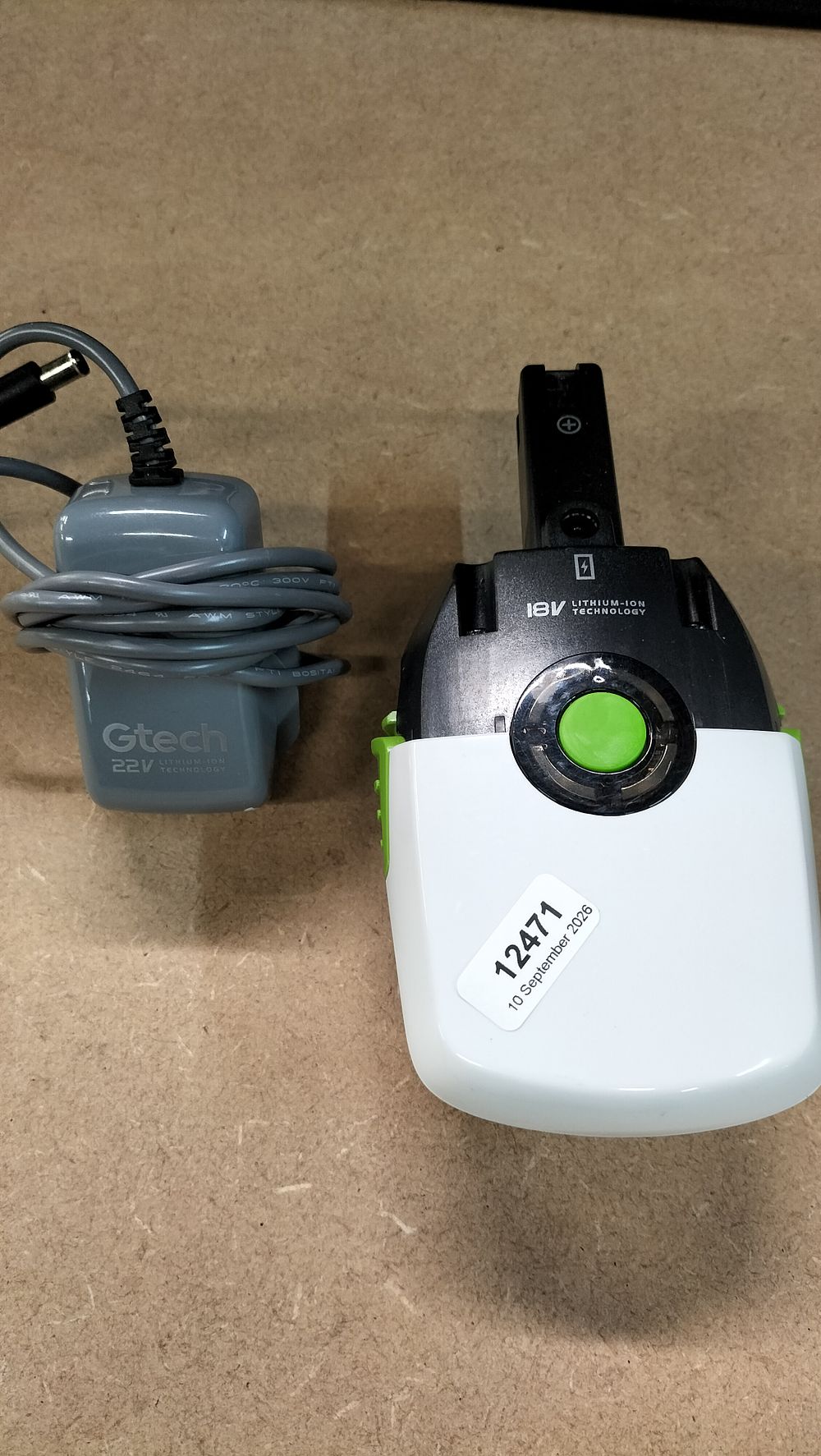Lot 208: A Gtech 18V Lithium-Ion Battery and 22V Power Adapter, Model 114A004