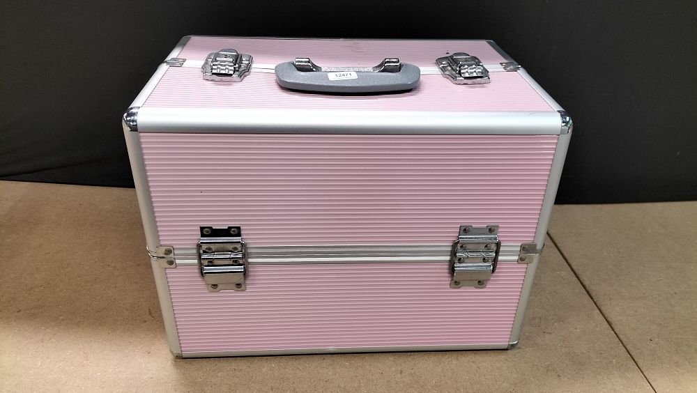 Lot 237: A Textured Pink Synthetic and Aluminium Tiered Makeup Train Case