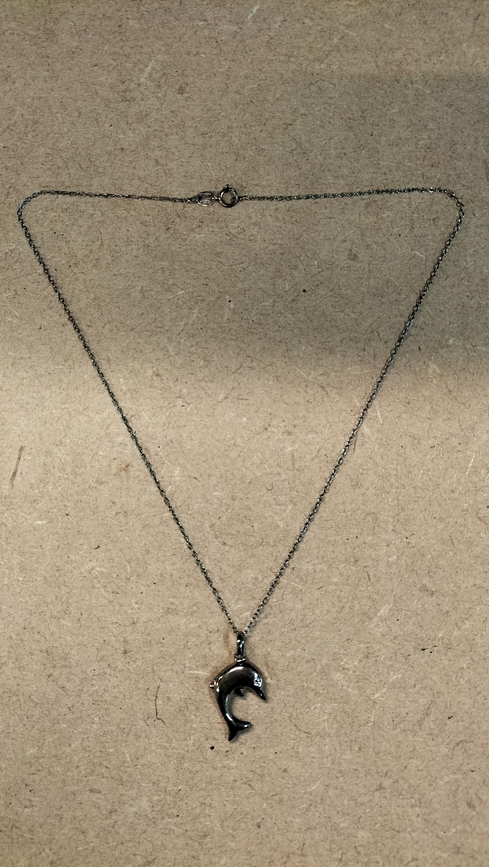Lot 252: An Optima 925 Sterling Silver Dolphin Pendant Necklace