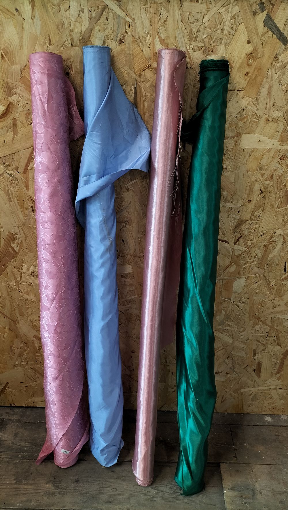 Lot 259: A Collection of 4 Rolls of Jacquard and Slubbed Dupion Style Fabric