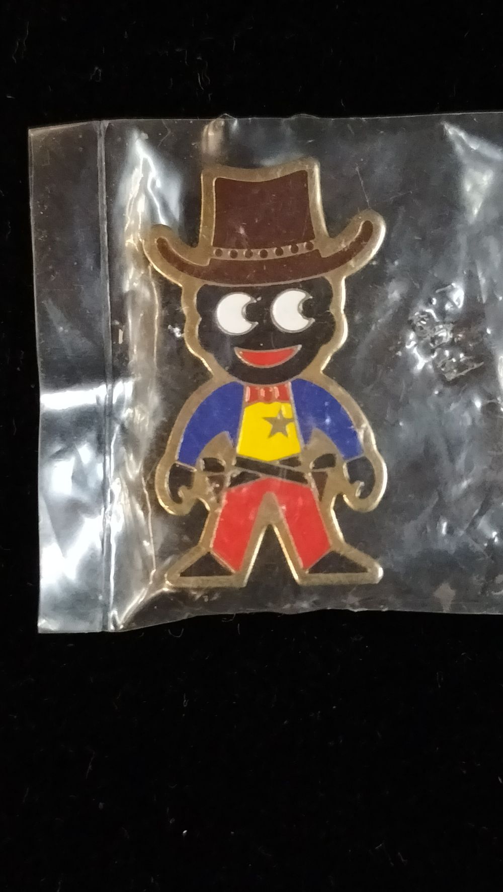Lot 280: A James Robertson & Sons P M Miller Ltd Enamel Cowboy Badge