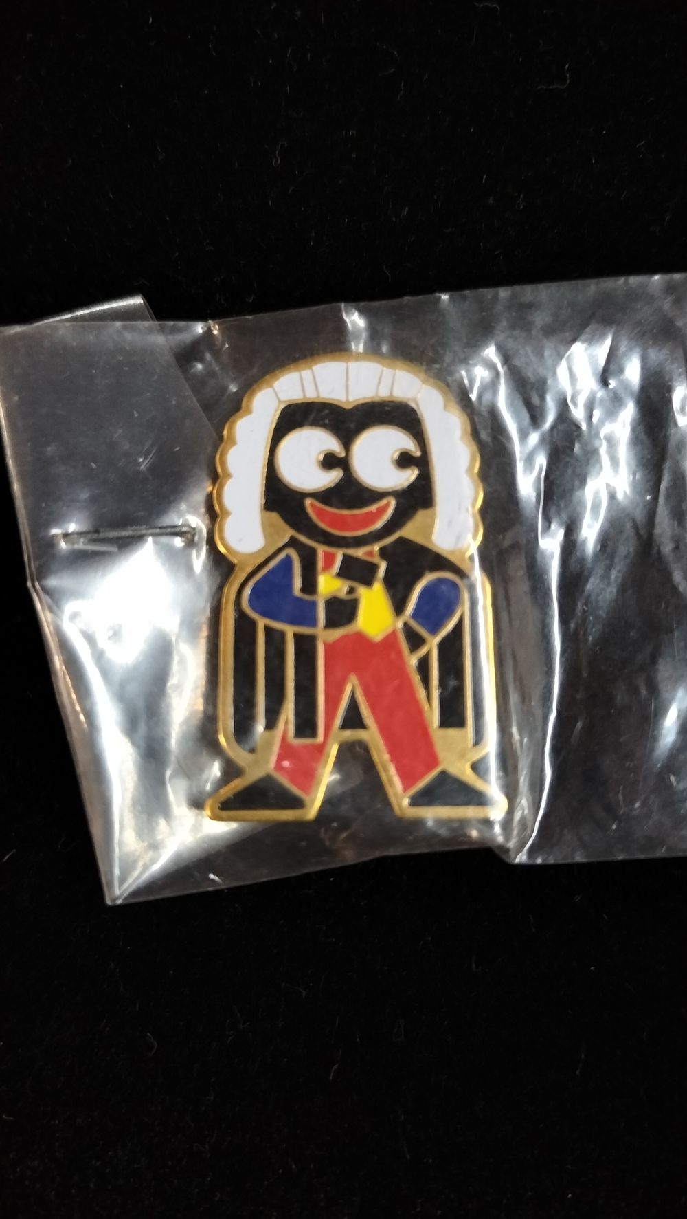Lot 281: A Robertson's Enamel Golly Judge Badge