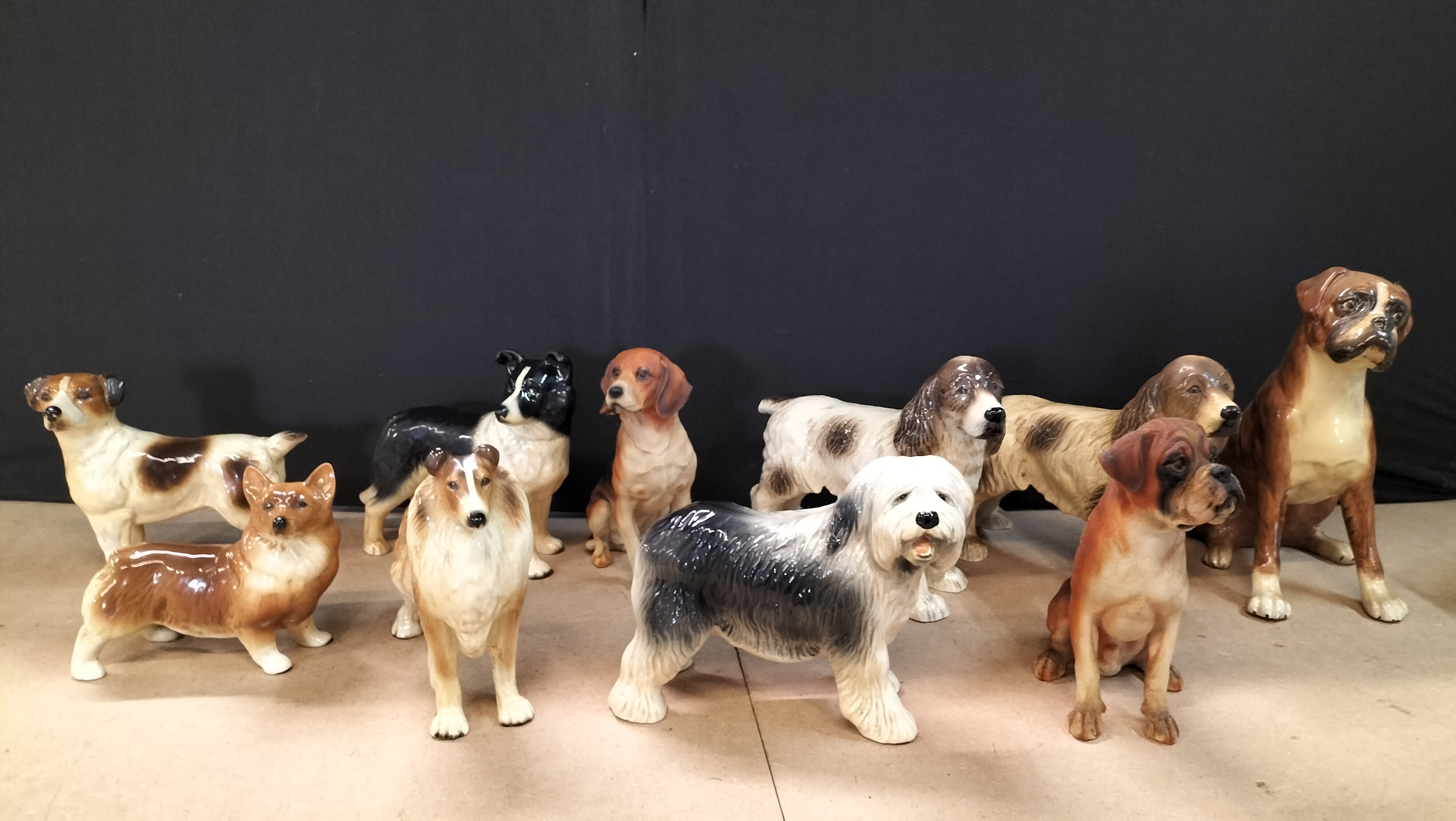 A Collection of 10 Glazed Ceramic Dog Figurines, Coopercraft