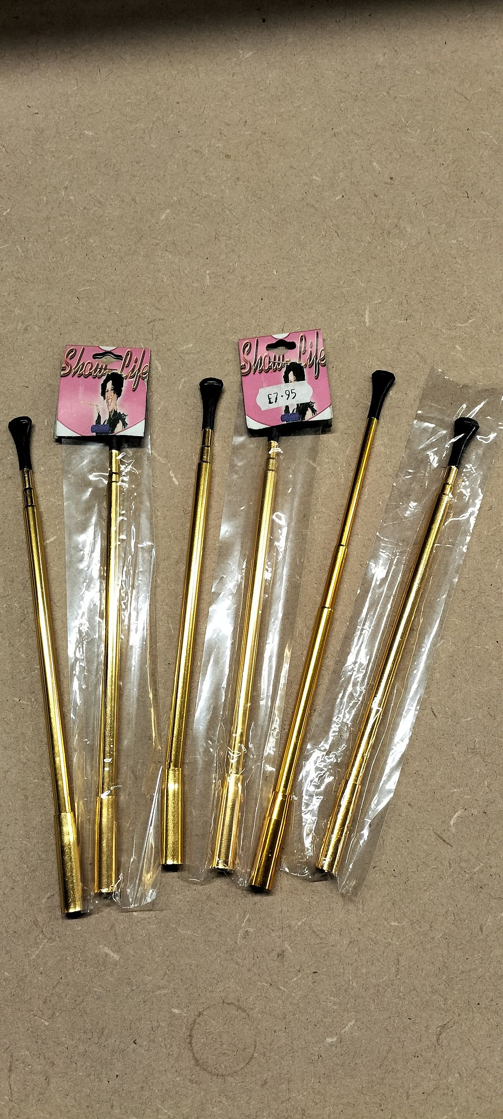Lot 305: 6 Show-Life Gold-Toned Metal Telescopic Cigarette Holders