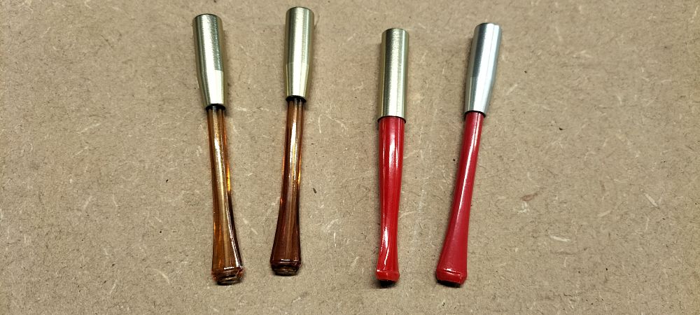 Lot 311: A Collection of 4 Vintage Ejector Cigarette Holders Made in England
