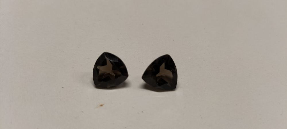 Lot 312: A Pair of Chocolate Topaz Trillion Cut Faceted Gemstones 6.10 ct