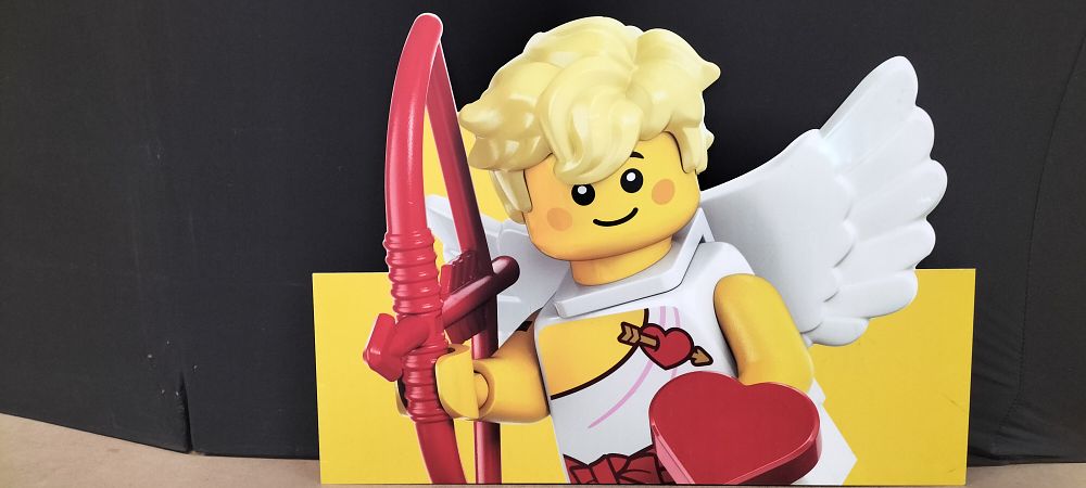 Lot 325: A LEGO Style Composite Minifigure Cupid Character Promotional Cutout