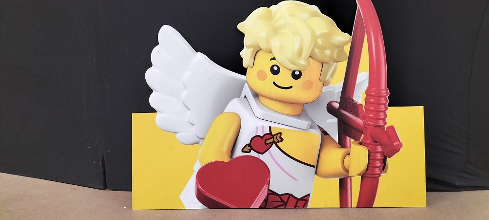 Lot 326: A LEGO Collectible Minifigure Cupid Card Promotional Standee