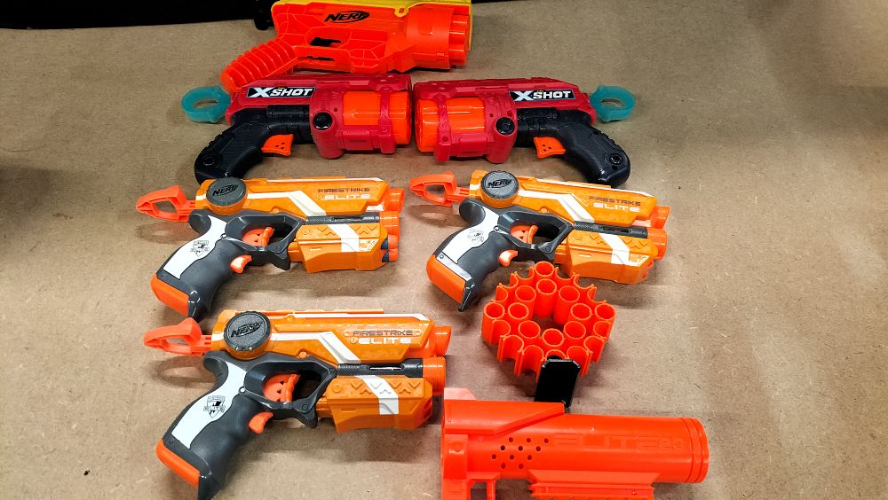 Lot 335: A Collection of Nerf and X-Shot Plastic Toy Foam Blasters and Accessories