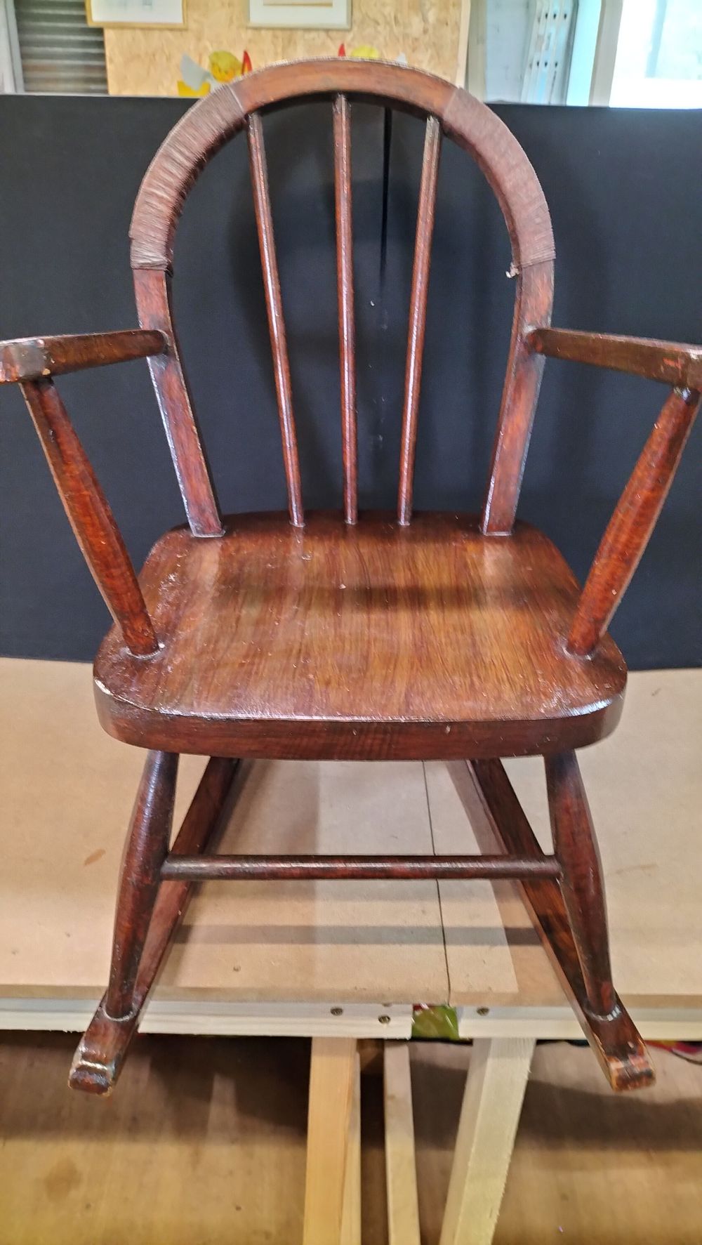 Lot 167: A Vintage Windsor Style Hardwood Child's Rocking Chair