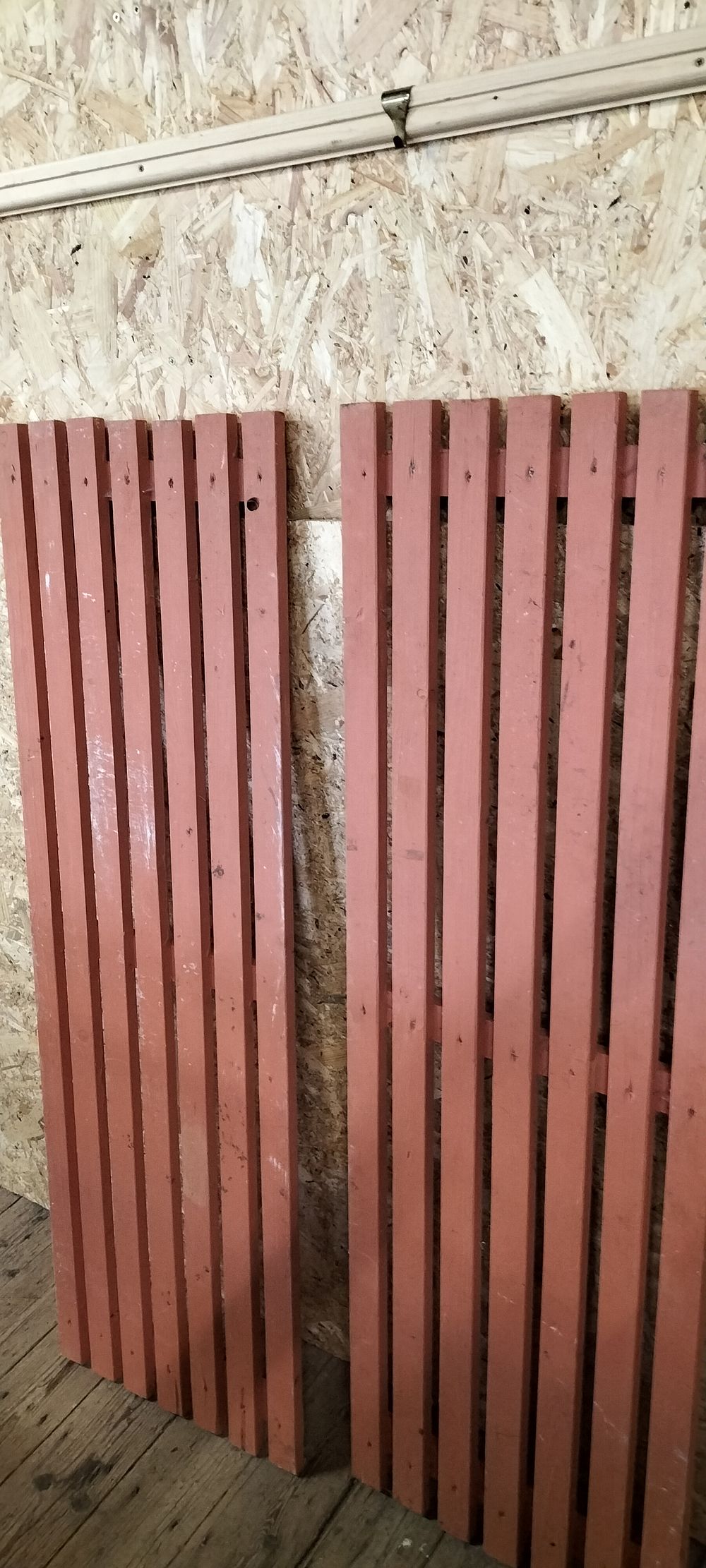 Lot 254: A Pair of Painted Wooden Slatted Panels