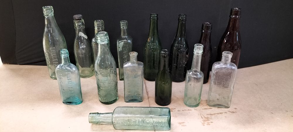 Lot 272: A Collection of Antique Glass Beverage and Medicinal Bottles