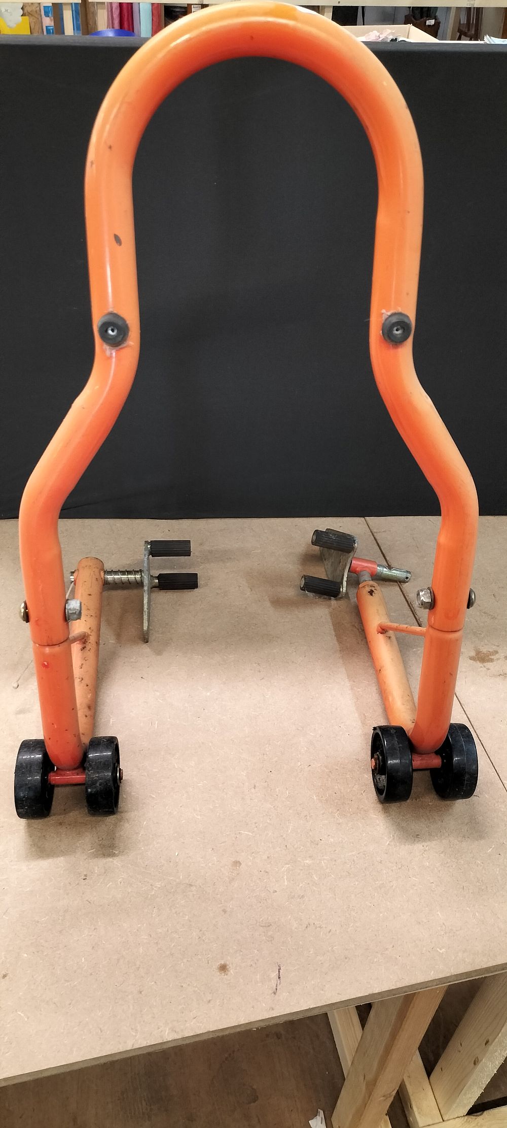 Lot 286: An Orange Tubular Steel Motorcycle Paddock Stand