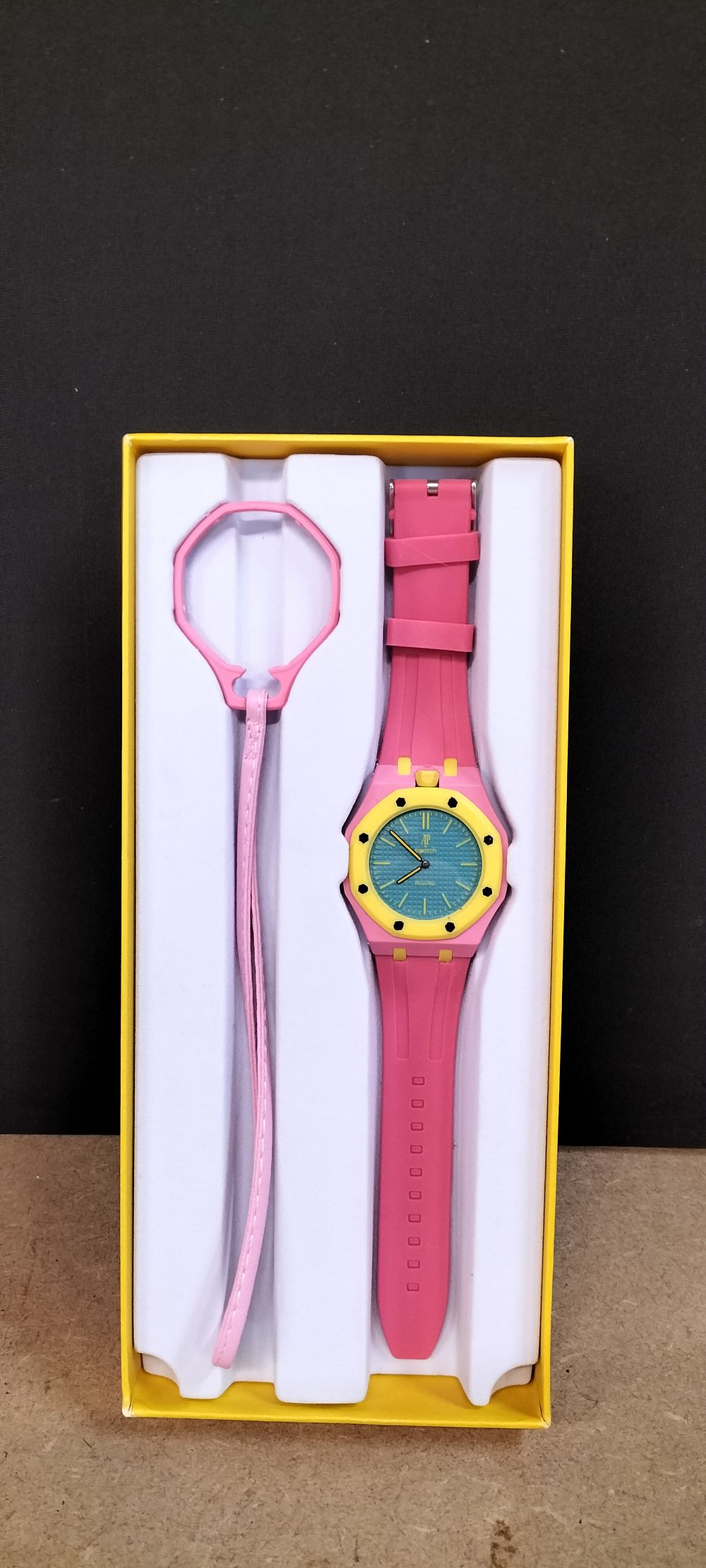 Lot 294: Fashion Pink and Yellow Silicone Wrist Watch