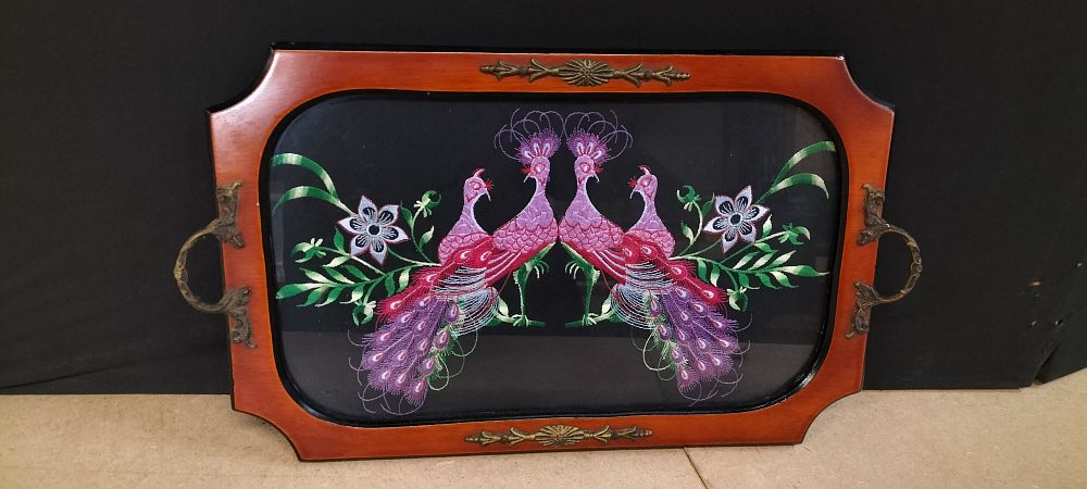 Lot 299: A Vintage Two-Handled Wooden Serving Tray with Peacock Embroidery Panel