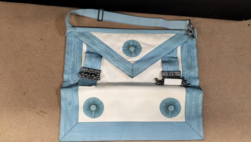 Lot 329: A Sky Blue and White Leather Masonic Master Mason Apron