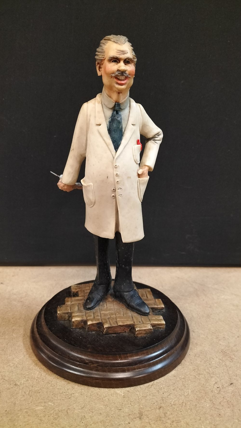 Lot 340: A Country Artists Hand Painted Composite Doctor Figurine by Wolfe 1997