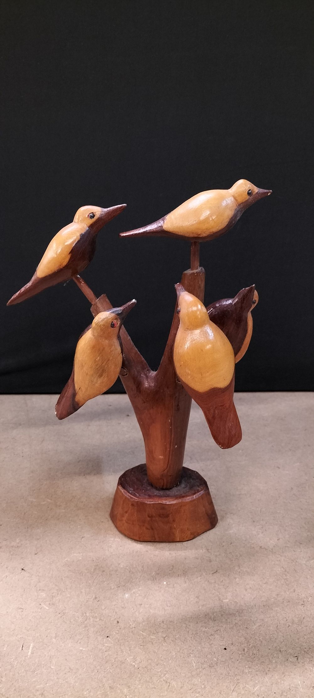 Lot 412: A Group of Hand Carved and Polished Wooden Bird Figurines
