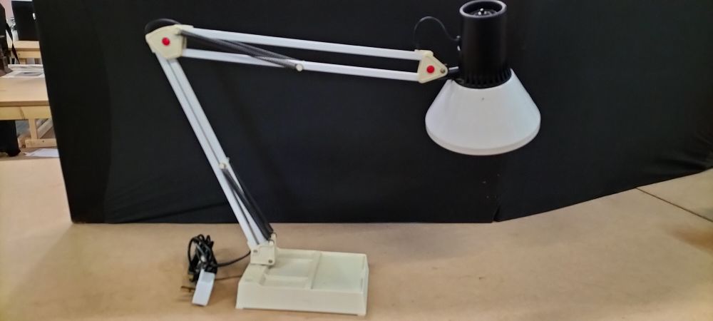Lot 159: A White and Black Metal and Plastic Articulated Desk Lamp