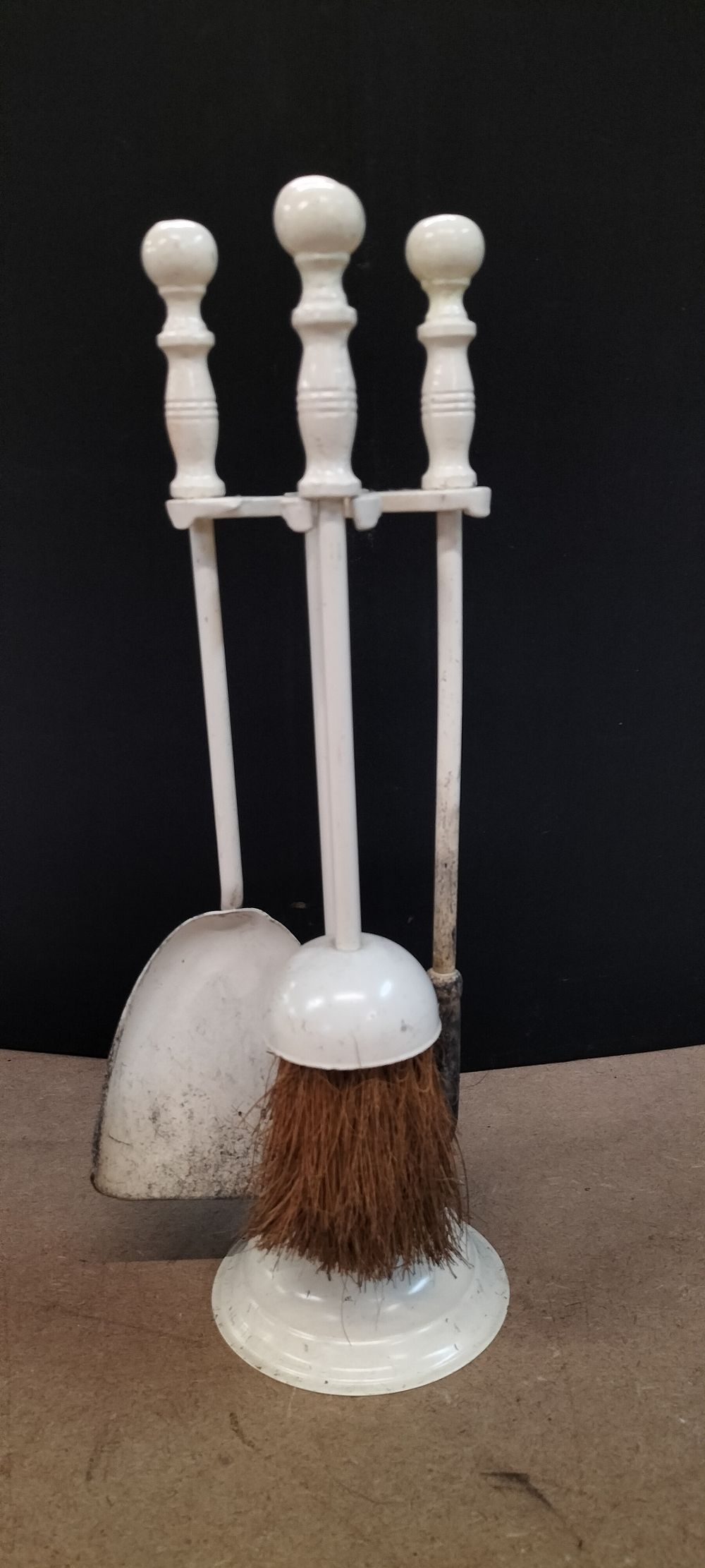 Lot 202: A White Finished Metal Three Piece Fireplace Tool Set with Stand