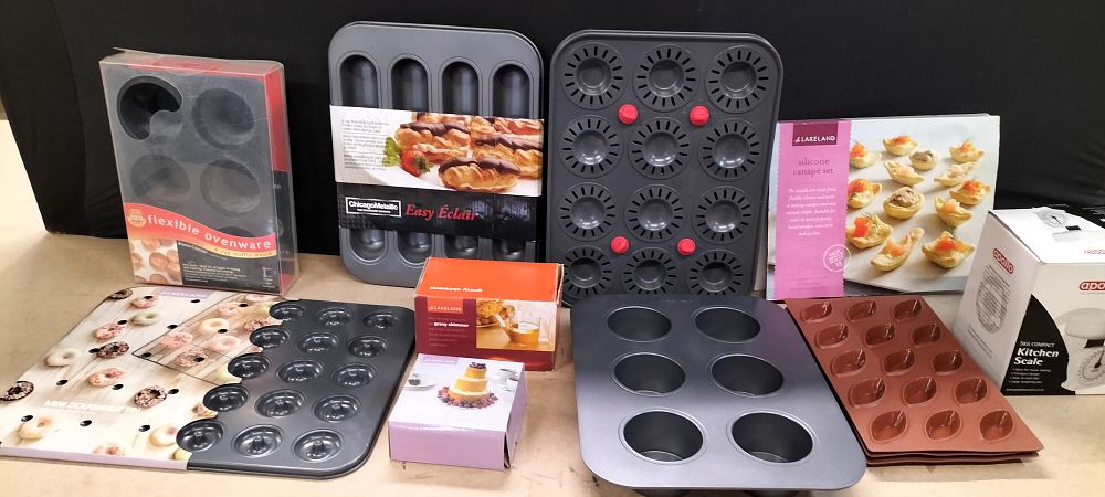 Lot 203: An Assortment of Lakeland, Chicago Metallic, and Apollo Kitchenware and Bakeware