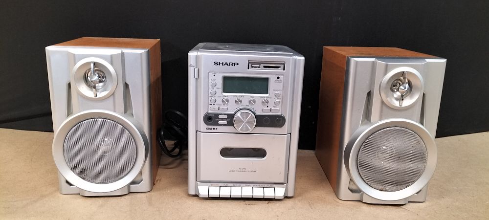 Lot 208: Sharp XL-UR5H Micro Component System with Pair of Matching CP-UR5H Speakers