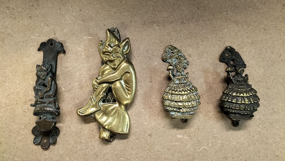 Lot 292: A Collection of 4 Vintage Cast Brass Door Knockers