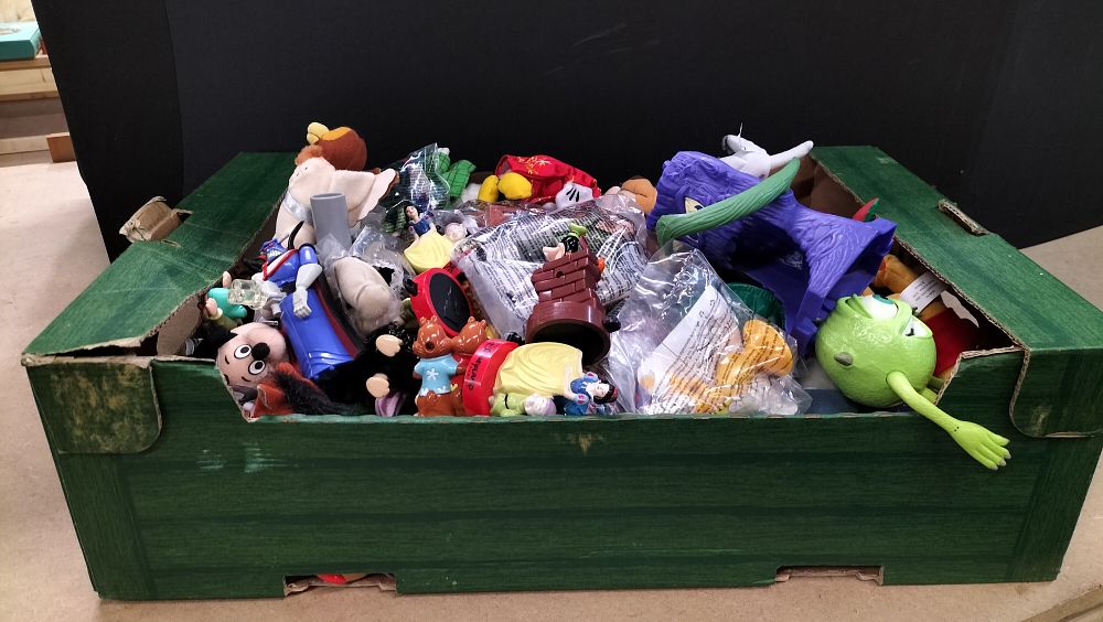 Lot 154: A Collection of Disney and McDonald's Plastic and Plush Toys