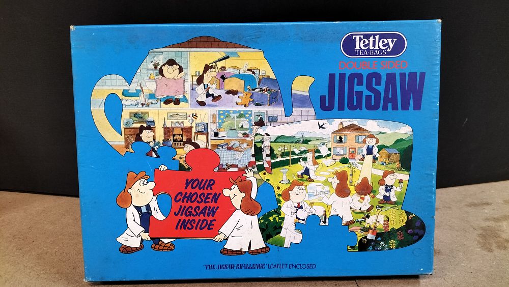 Lot 221: A Tetley Tea Bags Double Sided Jigsaw