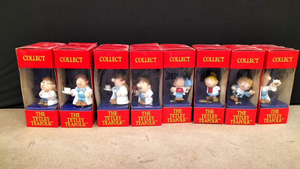 Lot 222: A Collection of 8 Tetley Teafolk Plastic Figurines in Original Boxes