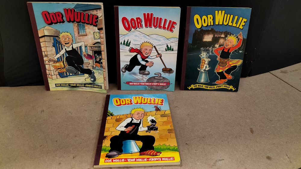 Lot 224: A Collection of Four D.C. Thomson & Co. Ltd. Oor Wullie Annuals
