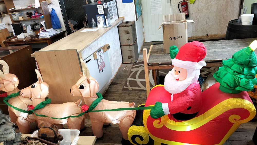 Lot 270: A Lighted Inflatable Santa in Sleigh with Two Reindeer