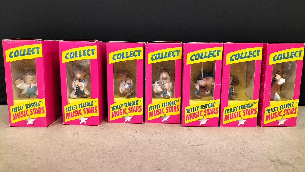 Lot 278: A Set of 7 Tetley Teafolk Music Stars Plastic Figurines