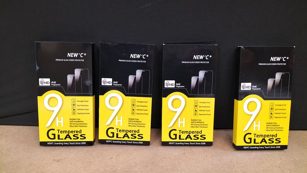 Lot 293: A Set of NEW'C 9H Tempered Glass Screen Protectors for iPhone 16 Pro Max