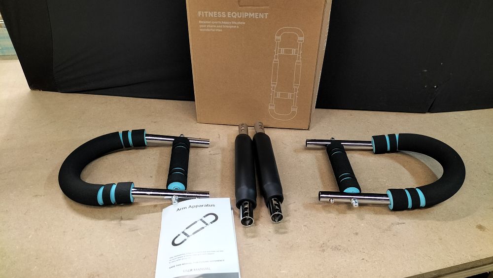 Lot 295: A Portable Steel and Foam Arm Apparatus Fitness Trainer