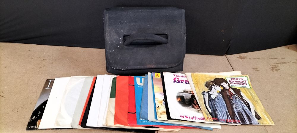 Lot 316: A Collection of 20 Vinyl 7-inch Singles and Padded Fabric Carrying Case