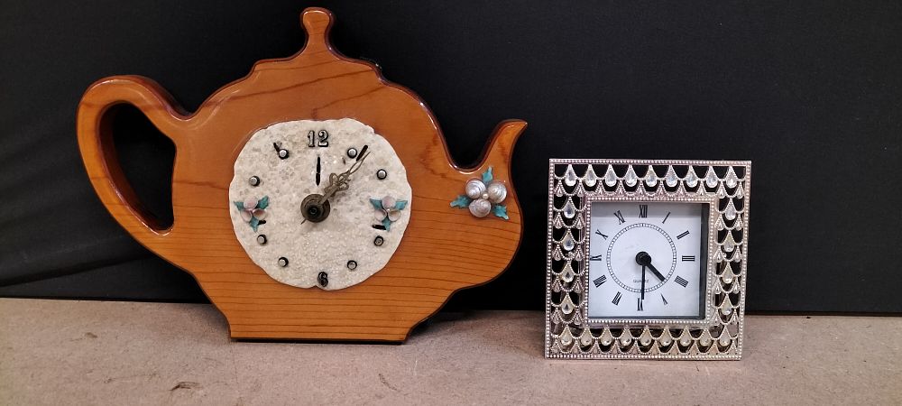 Lot 330: Two Decorative Quartz Mantel Clocks including Teapot Shaped Wood and Filigree Designs